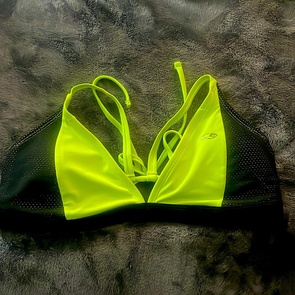 neon green and black champion swim suit top